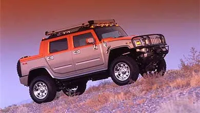 Hummer on top of a hill